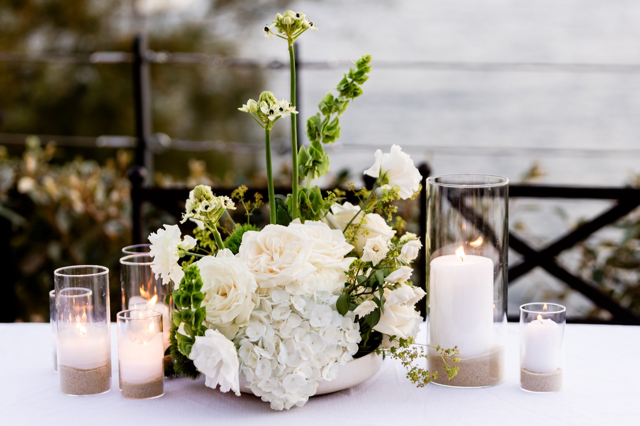 White floral styling and candlelight