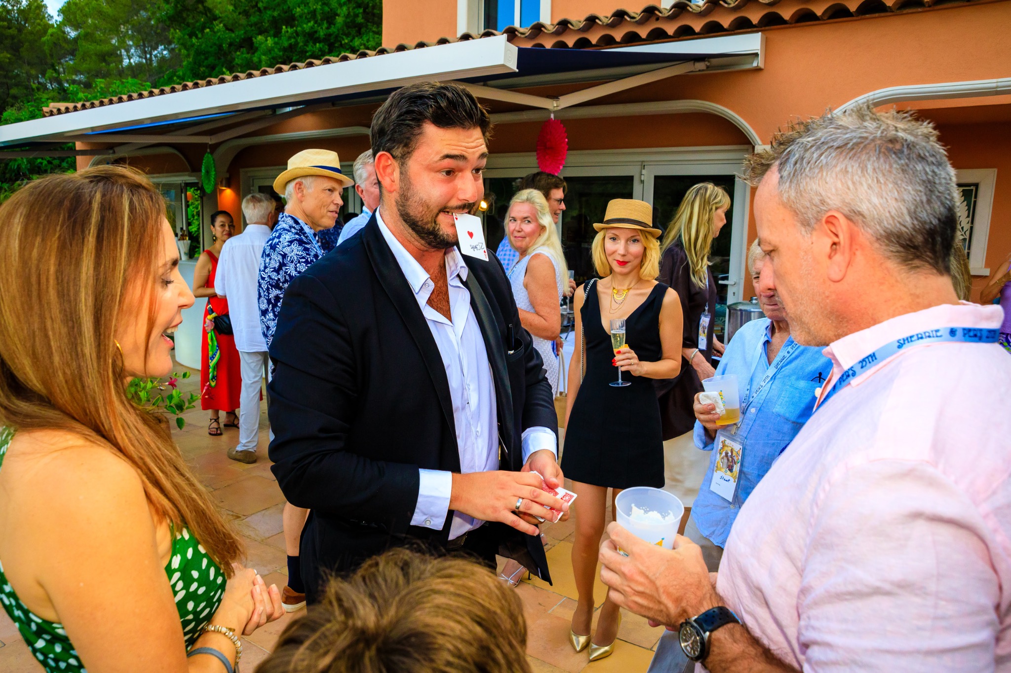 Guests arriving and greeting one another at the party