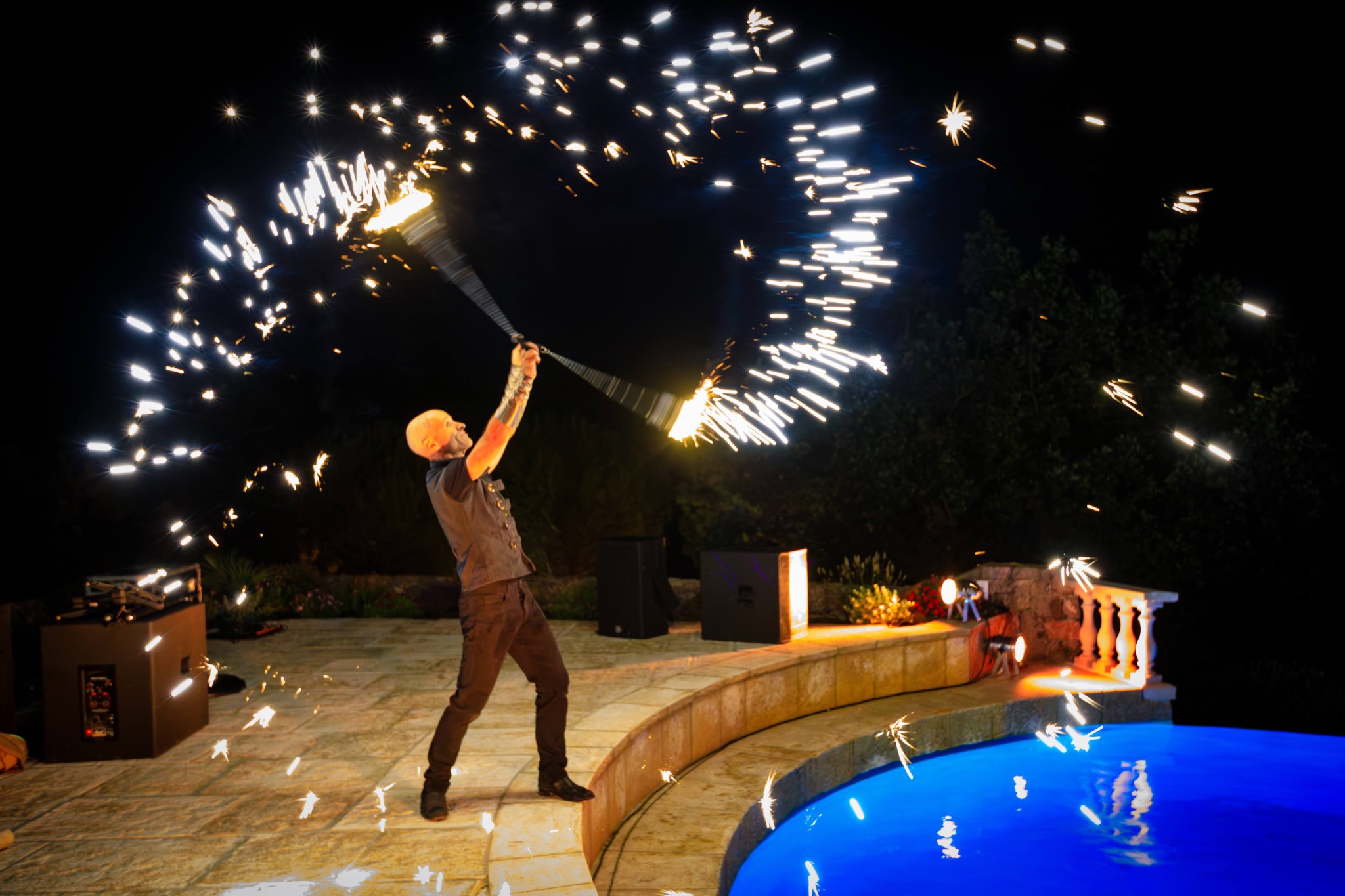 Fire performer lighting up the evening celebration
