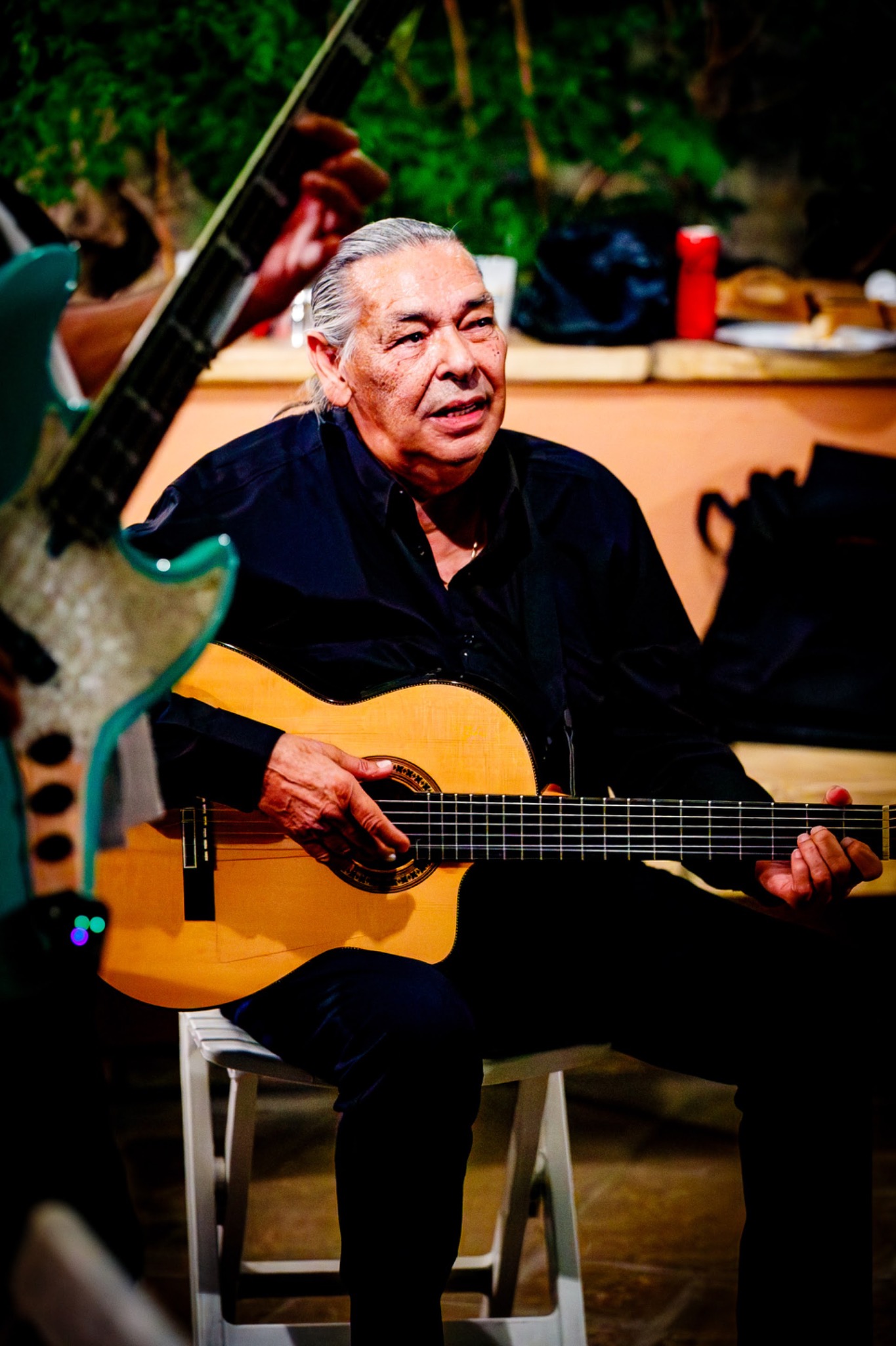 Guitarist playing live at the anniversary celebration